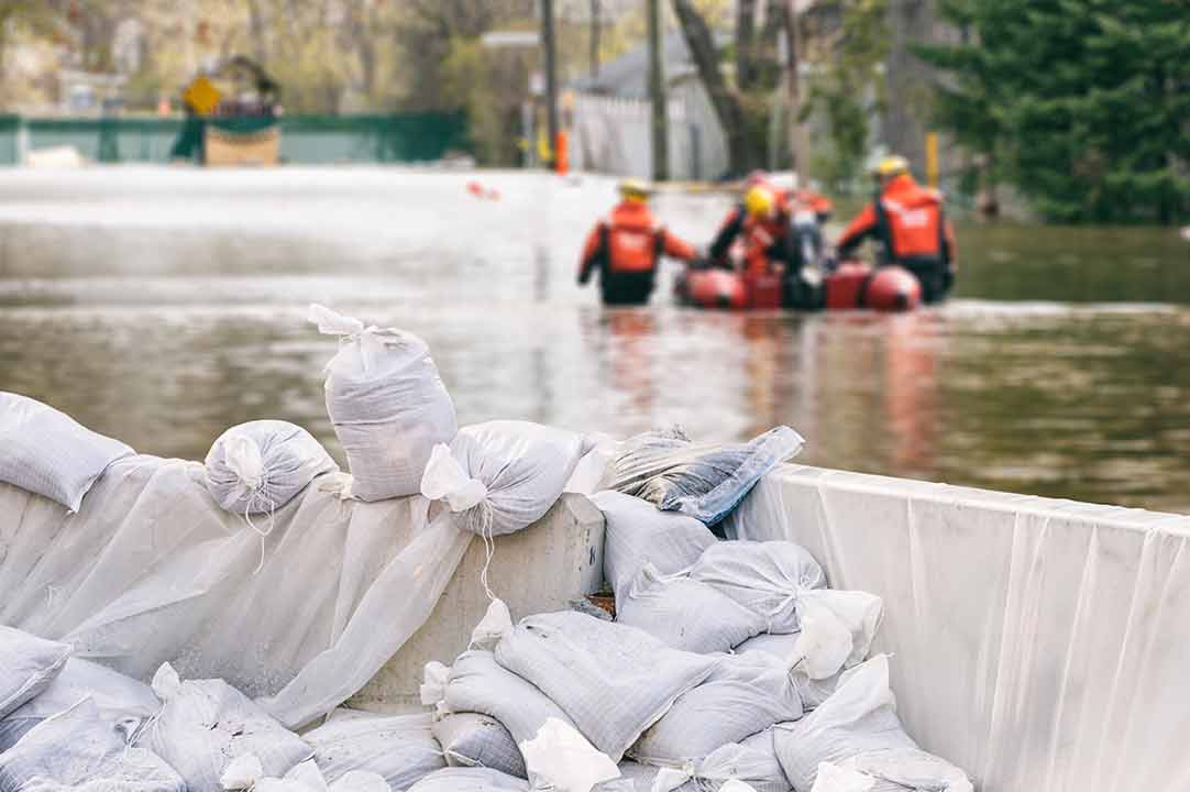image of a rescue crew in the middle of a flood