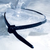 7" Cold Weather UV Black Nylon 50 lb. Zip Ties, 100/Pack thumbnail 1